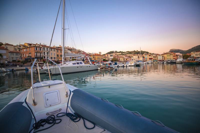 Company outing on Mediterranean waters, employees collaborating aboard a L’Eden Boat charter